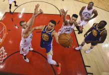 Warriors hang on to stay alive, win Game 5 of NBA Finals