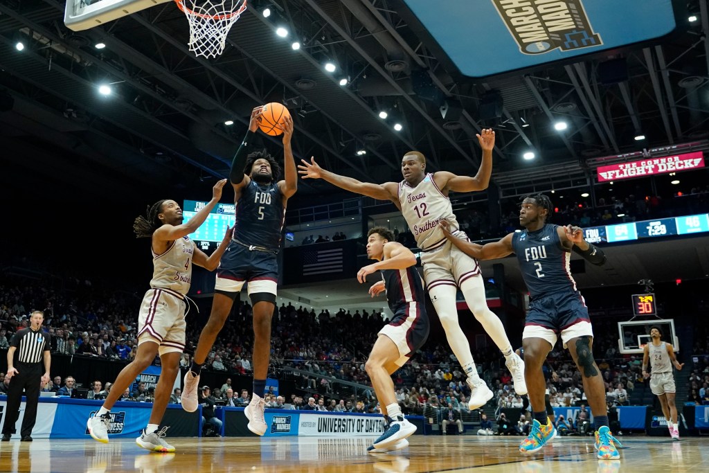 Fairleigh Dickinson's Ansley Almonor (5) grabs a rebound during the second half of a First Four college basketball game against Texas Southern in the NCAA men's basketball tournament, Wednesday, March 15, 2023, in Dayton, Ohio. 