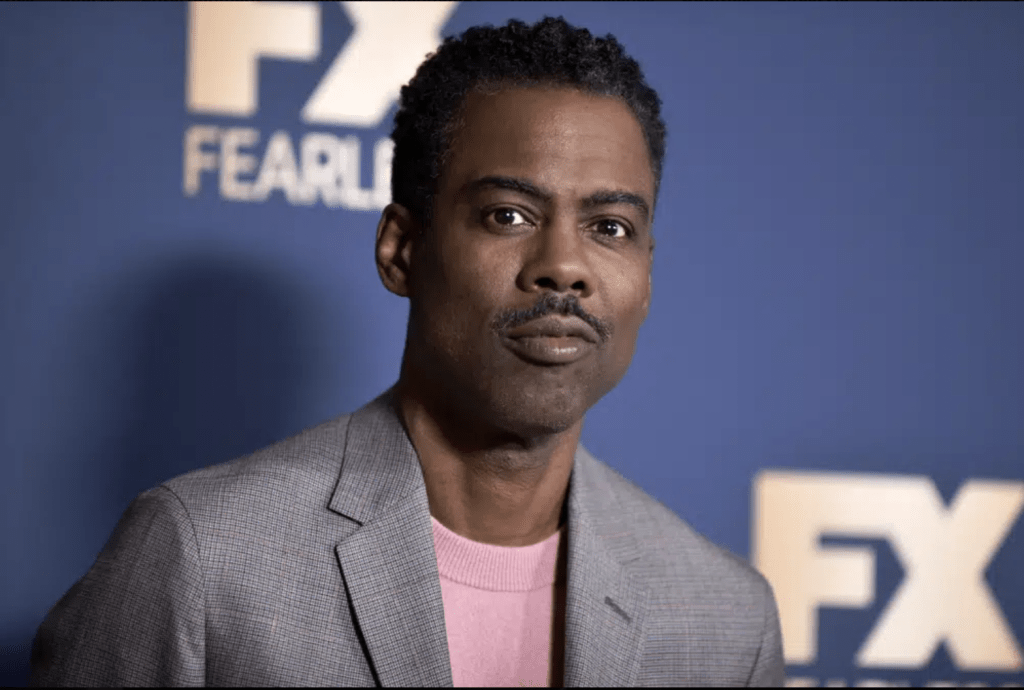 FILE - Chris Rock appears at the Television Critics Association Winter press tour in Pasadena, Calif., on Jan. 9, 2020. Rock will be the first artist to perform on Netflix's first-ever live, global streaming event. 