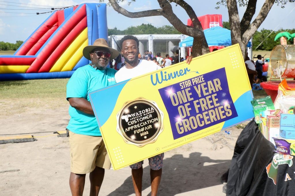 Tunde Fasina (left) with grand prize winner