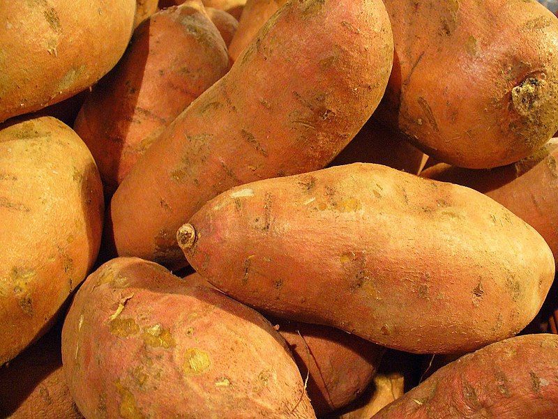 A pile of sweet potatoes.