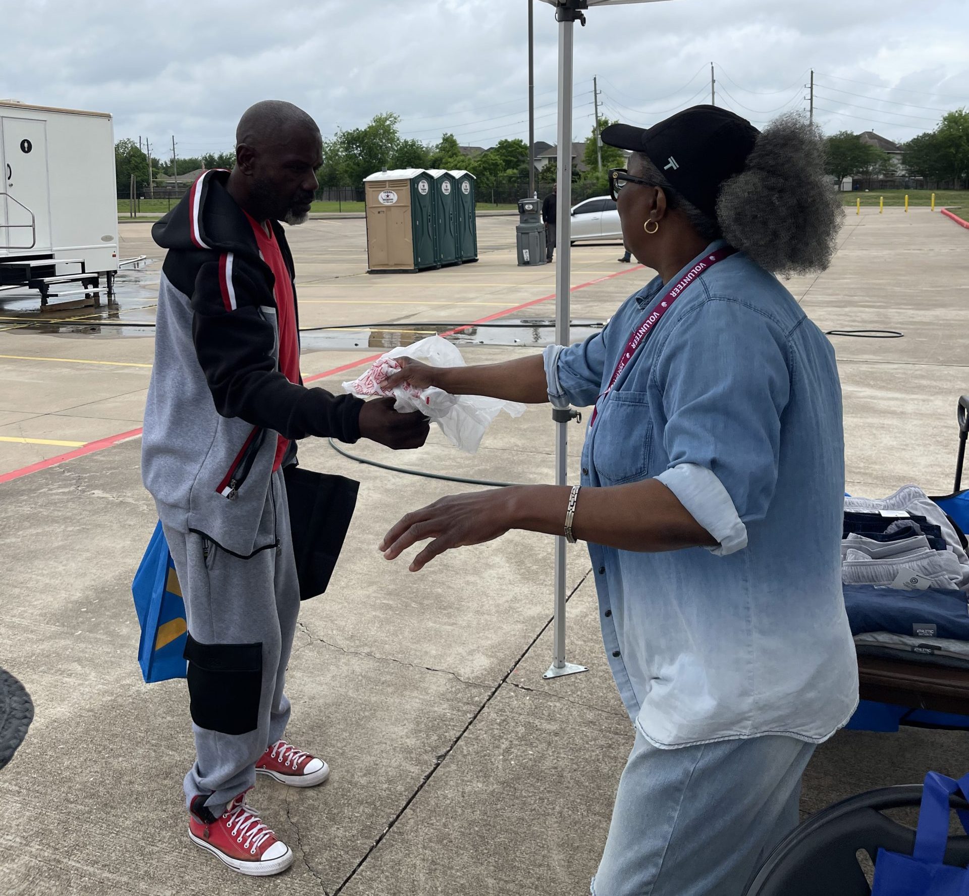 Houston’s west side brings showers, services to the unhoused